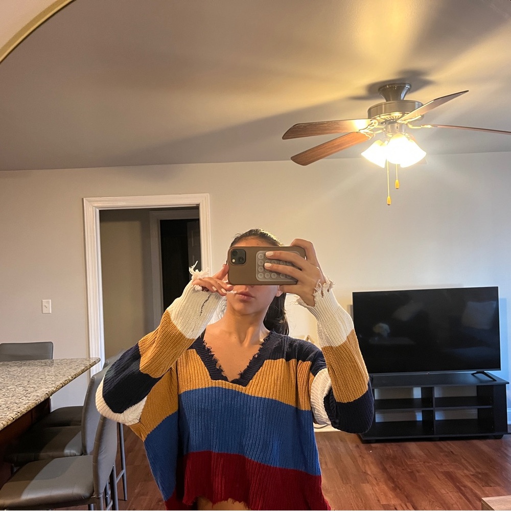 Multicoloured sweater with fringe detail from a boutique worn once